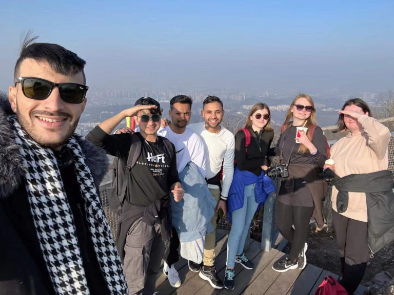 PrimeLink team and international friends on a hiking trip in China